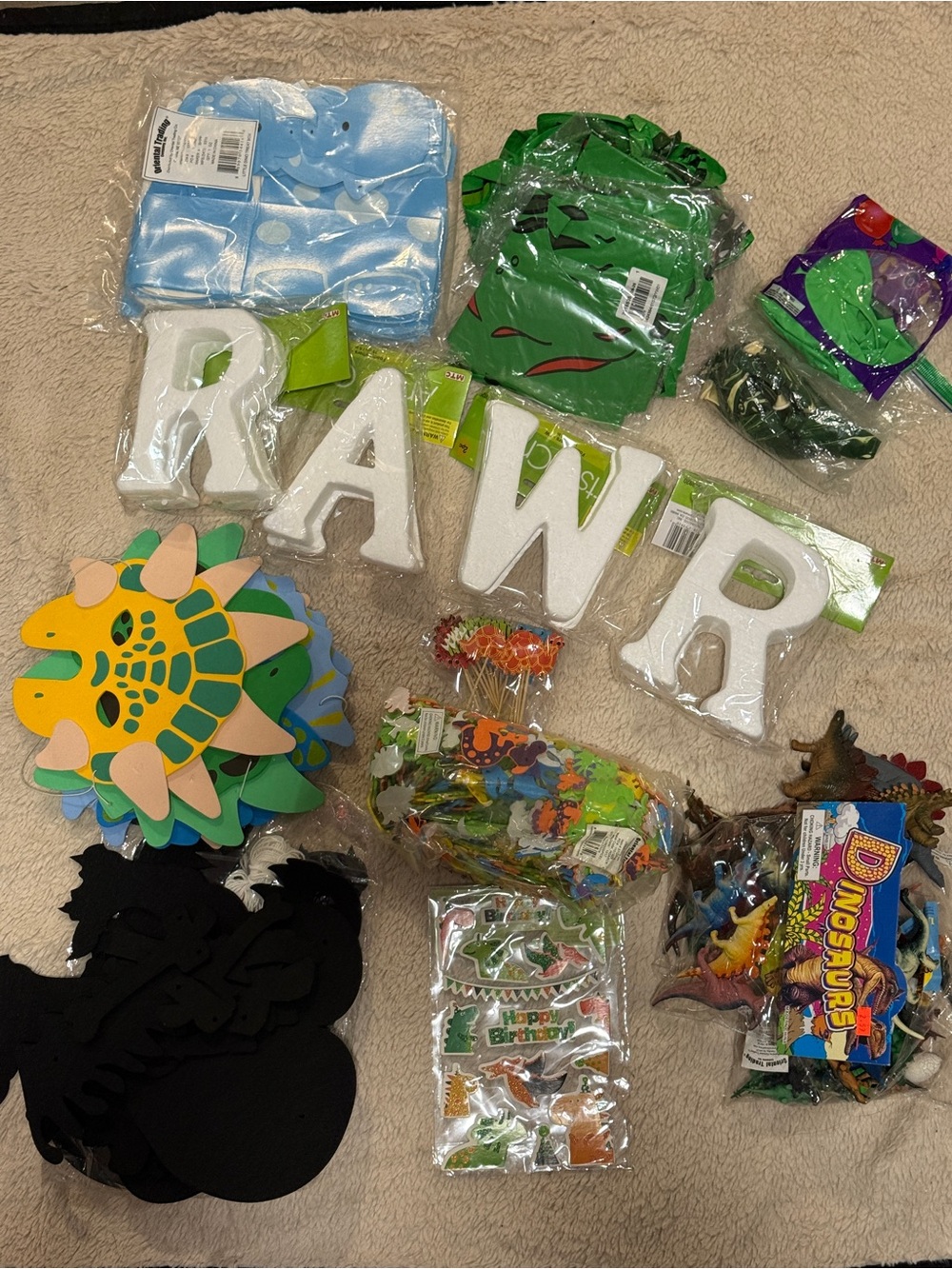 Dinosaur themed birthday party bundle of decorations and favors